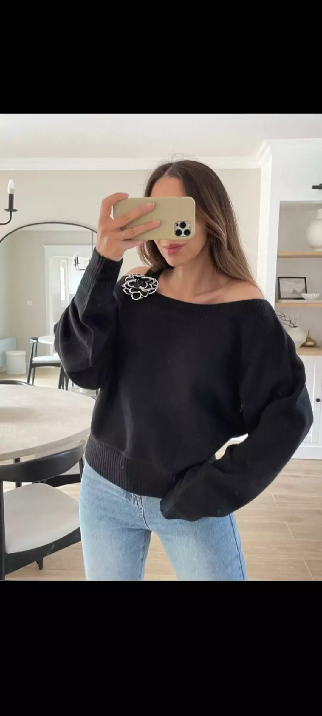 Pull avec fleur